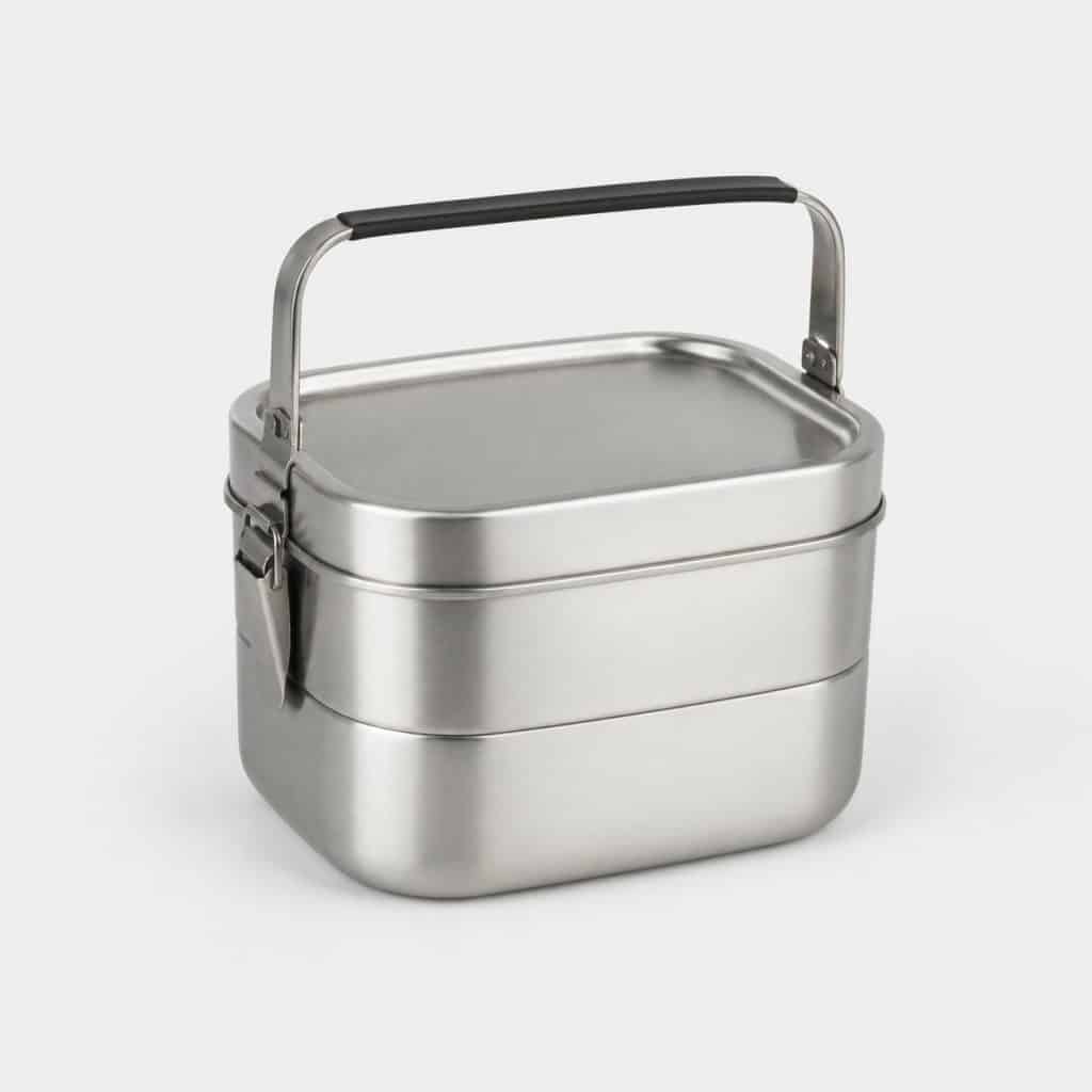 Boîte alimentaire isotherme en acier inoxydable sur fond clair