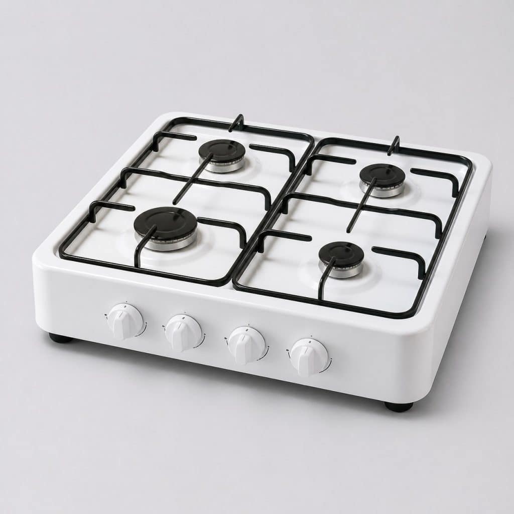 Plaque de cuisson gaz portable blanche à quatre feux sur fond clair